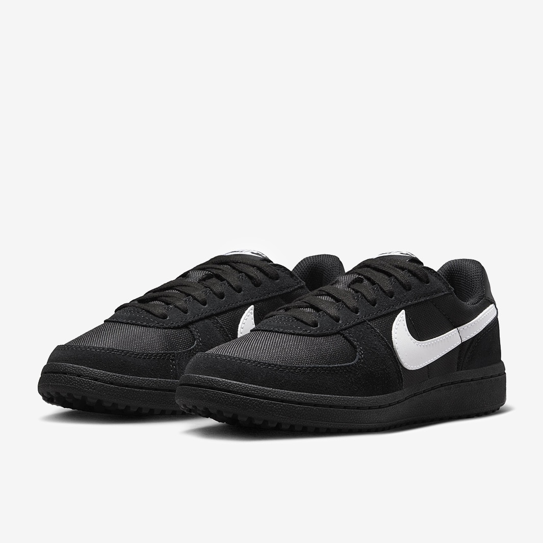 nike small tick trainers