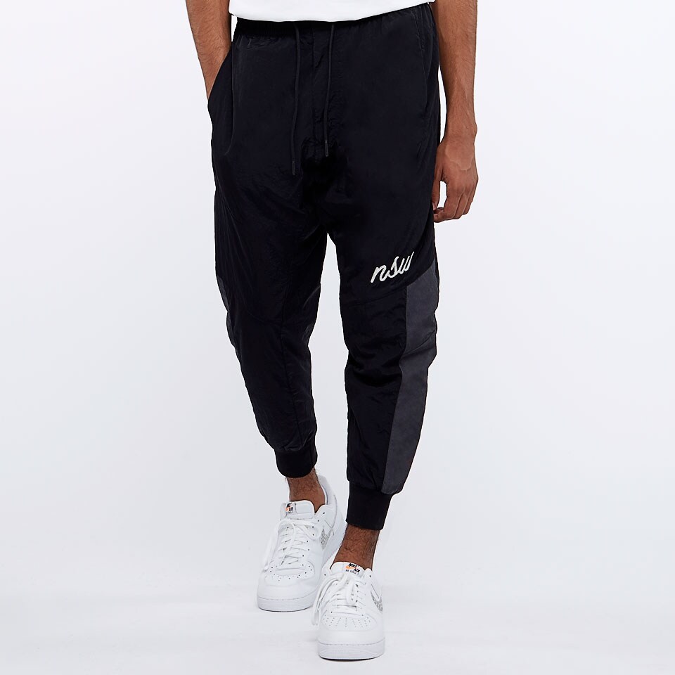 Nike nsw. Nike NSW Jogger Woven. Nike Sportswear Joggers Woven. Брюки Nike Woven Jogger. Nike Running Woven Joggers in Black.