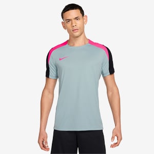 teal and pink nike shirt
